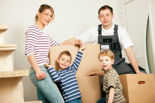 Removal van and moving boxes during house removals in Chessington