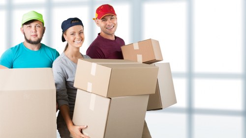 Packing and organizing belongings for storage in Chessington